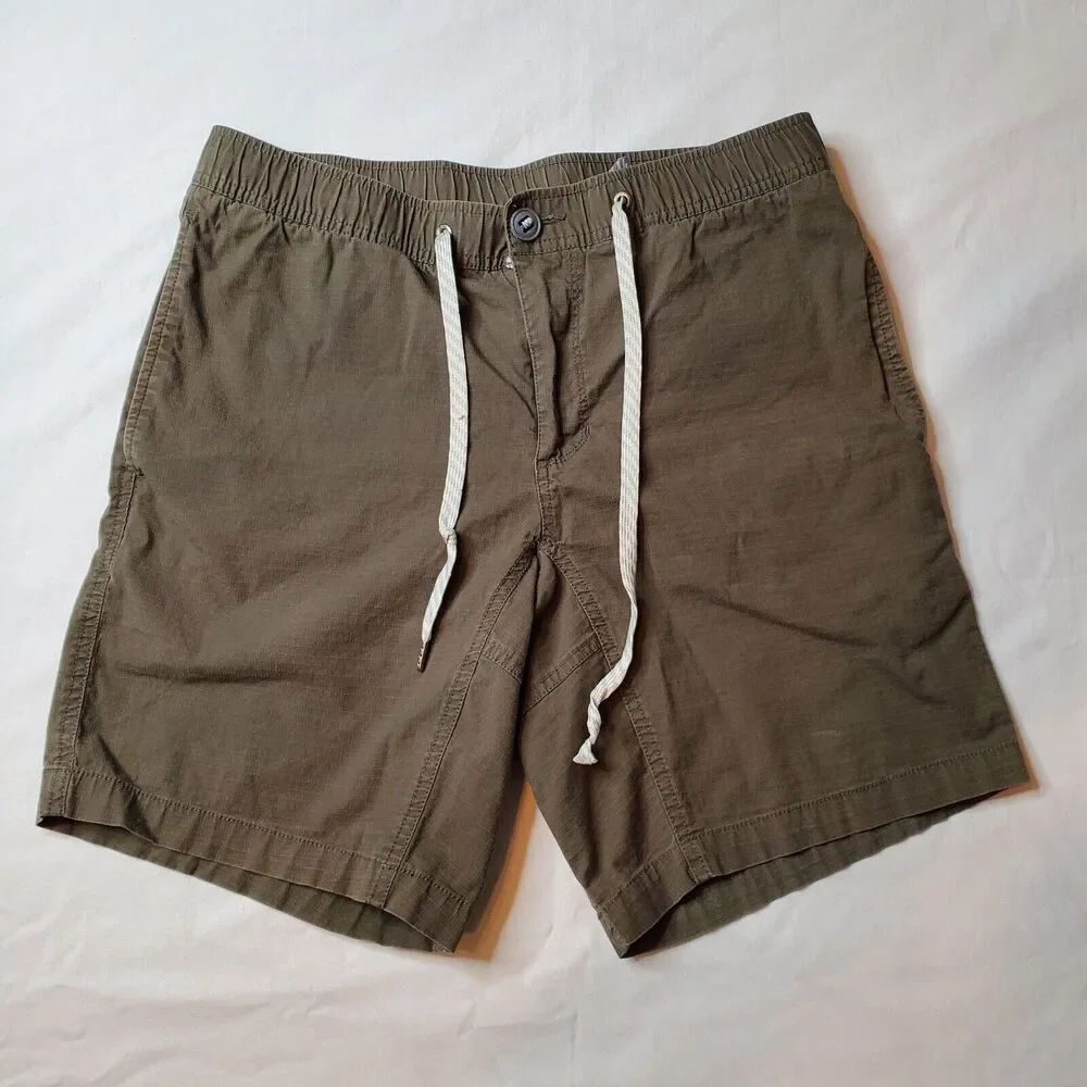 Vuori Men's Flat Front Drawstring Shorts in Olive